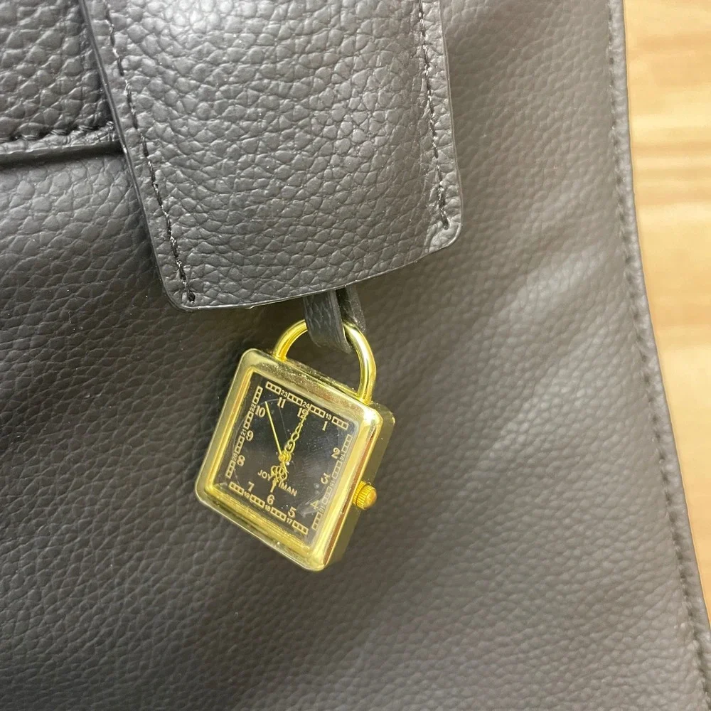 JOY & IMAN Black Textured Leather Tote Bag with Gold Accents and‎ Charm Watch